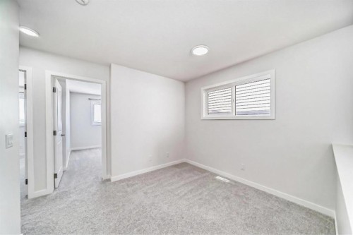 615 Lucas Boulevard Nw, Calgary, AB - Indoor Photo Showing Other Room