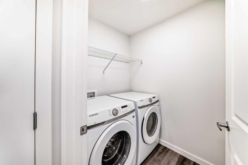 615 Lucas Boulevard Nw, Calgary, AB - Indoor Photo Showing Laundry Room