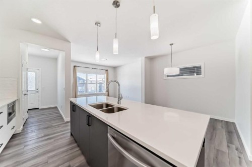 615 Lucas Boulevard Nw, Calgary, AB - Indoor Photo Showing Kitchen With Double Sink With Upgraded Kitchen