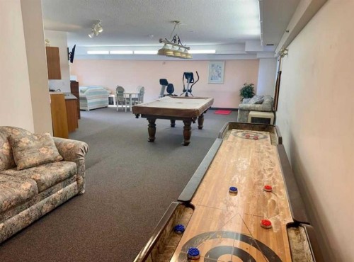 215-200 Lincoln Way Sw, Calgary, AB - Indoor Photo Showing Other Room