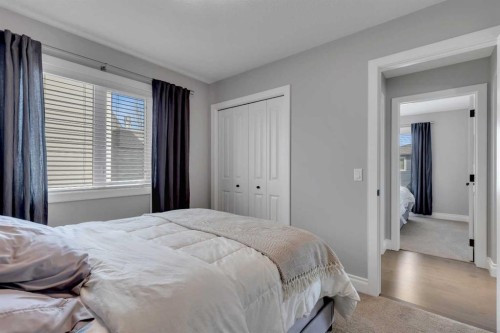 393 Evansborough Way Nw, Calgary, AB - Indoor Photo Showing Bedroom