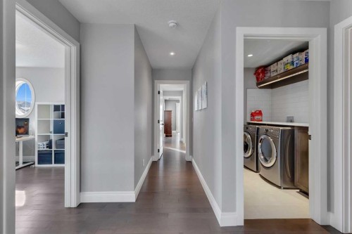 393 Evansborough Way Nw, Calgary, AB - Indoor Photo Showing Laundry Room