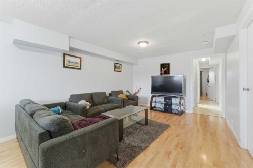 1827 46 Street Se, Calgary, AB - Indoor Photo Showing Living Room