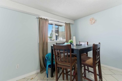 1827 46 Street Se, Calgary, AB - Indoor Photo Showing Dining Room