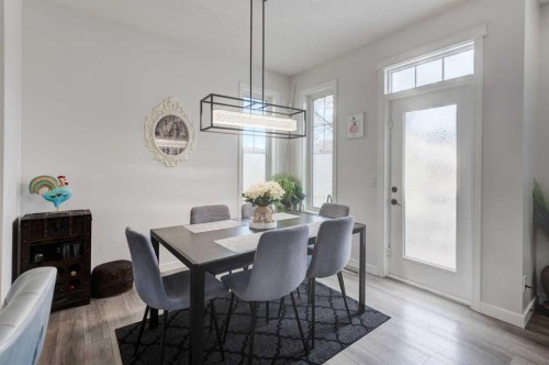 52 Bridlemeadows Common Sw, Calgary, AB - Indoor Photo Showing Dining Room