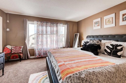 52 Bridlemeadows Common Sw, Calgary, AB - Indoor Photo Showing Bedroom