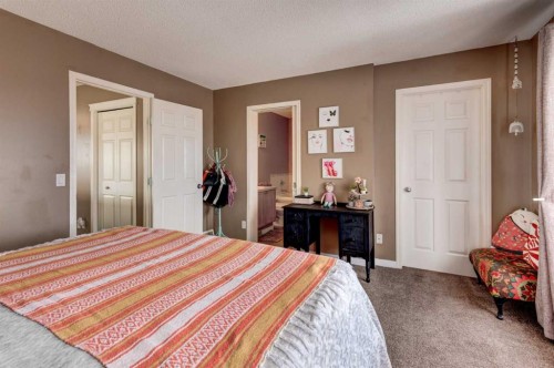 52 Bridlemeadows Common Sw, Calgary, AB - Indoor Photo Showing Bedroom