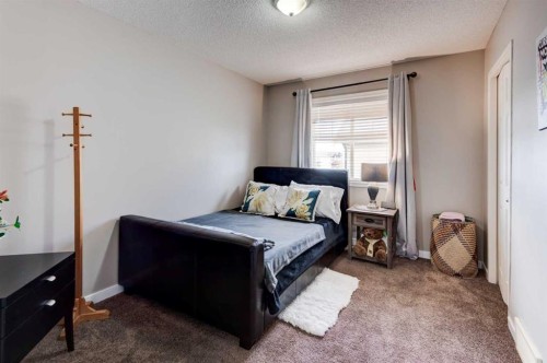 52 Bridlemeadows Common Sw, Calgary, AB - Indoor Photo Showing Bedroom