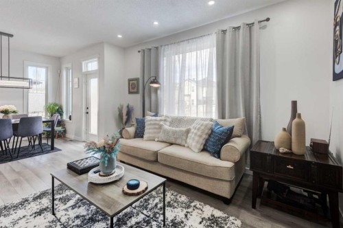 52 Bridlemeadows Common Sw, Calgary, AB - Indoor Photo Showing Living Room