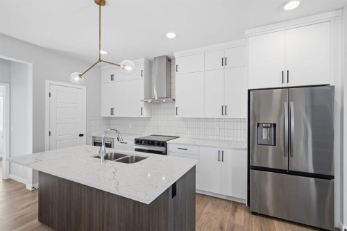 151 Ellen Road, Crossfield, AB - Indoor Photo Showing Kitchen With Double Sink With Upgraded Kitchen