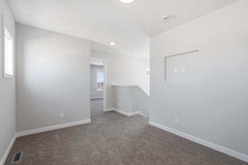 151 Ellen Road, Crossfield, AB - Indoor Photo Showing Other Room