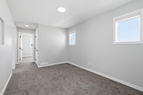 151 Ellen Road, Crossfield, AB - Indoor Photo Showing Other Room