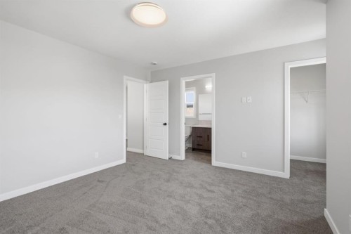 151 Ellen Road, Crossfield, AB - Indoor Photo Showing Other Room