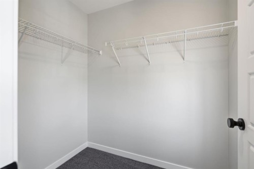 151 Ellen Road, Crossfield, AB - Indoor With Storage