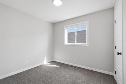 151 Ellen Road, Crossfield, AB - Indoor Photo Showing Other Room