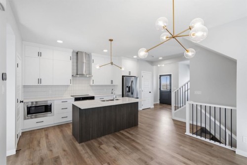 151 Ellen Road, Crossfield, AB - Indoor Photo Showing Kitchen With Double Sink With Upgraded Kitchen