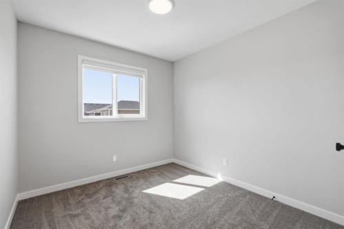 151 Ellen Road, Crossfield, AB - Indoor Photo Showing Other Room