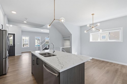 151 Ellen Road, Crossfield, AB - Indoor Photo Showing Kitchen With Double Sink With Upgraded Kitchen