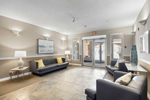6309-14 Hemlock Crescent Sw, Calgary, AB - Indoor Photo Showing Living Room