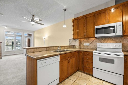 6309-14 Hemlock Crescent Sw, Calgary, AB - Indoor Photo Showing Kitchen With Double Sink