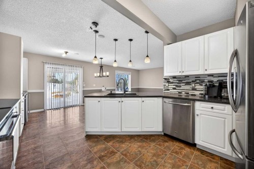 378 Panamount Drive Nw, Calgary, AB - Indoor Photo Showing Kitchen With Upgraded Kitchen