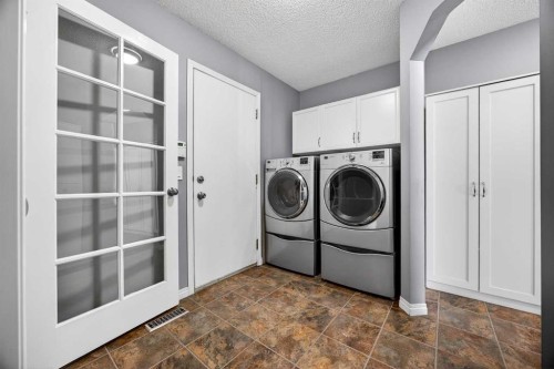 378 Panamount Drive Nw, Calgary, AB - Indoor Photo Showing Laundry Room