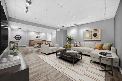 378 Panamount Drive Nw, Calgary, AB - Indoor Photo Showing Living Room