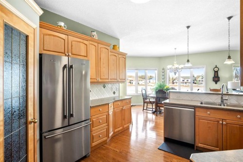 35 Lake Ridge, Olds, AB - Indoor Photo Showing Kitchen With Double Sink