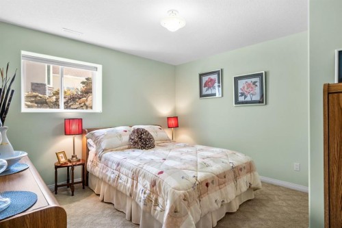 35 Lake Ridge, Olds, AB - Indoor Photo Showing Bedroom