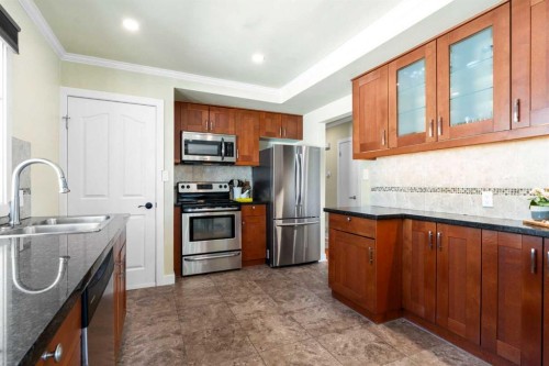 6112 Buckthorn Road Nw, Calgary, AB - Indoor Photo Showing Kitchen With Stainless Steel Kitchen With Double Sink