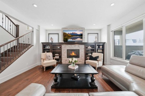 201 12 Street Ne, Calgary, AB - Indoor Photo Showing Living Room With Fireplace