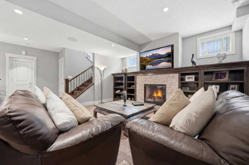 201 12 Street Ne, Calgary, AB - Indoor Photo Showing Living Room With Fireplace