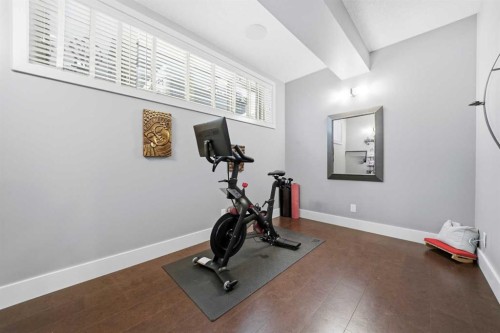 201 12 Street Ne, Calgary, AB - Indoor Photo Showing Gym Room
