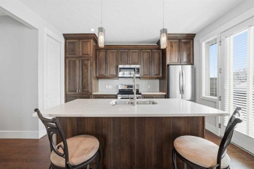 201 12 Street Ne, Calgary, AB - Indoor Photo Showing Kitchen With Stainless Steel Kitchen With Double Sink With Upgraded Kitchen