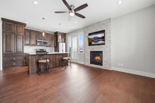 201 12 Street Ne, Calgary, AB - Indoor With Fireplace