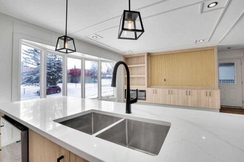 908 Stonehaven Road Sw, Calgary, AB - Indoor Photo Showing Kitchen With Double Sink