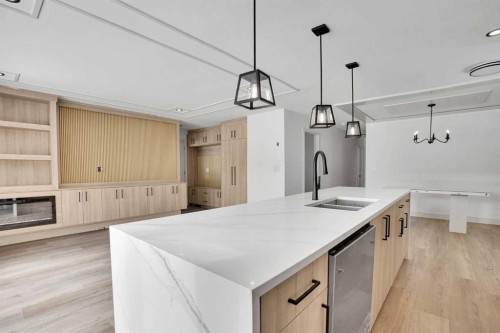 908 Stonehaven Road Sw, Calgary, AB - Indoor Photo Showing Kitchen With Double Sink
