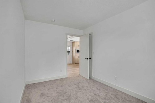 908 Stonehaven Road Sw, Calgary, AB - Indoor Photo Showing Other Room