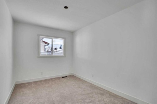 908 Stonehaven Road Sw, Calgary, AB - Indoor Photo Showing Other Room
