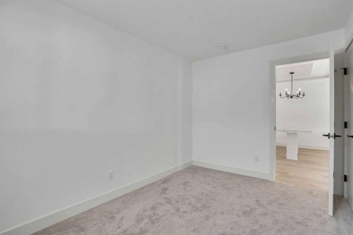 908 Stonehaven Road Sw, Calgary, AB - Indoor Photo Showing Other Room