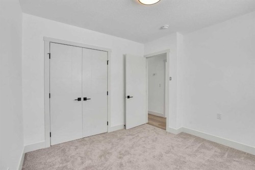 908 Stonehaven Road Sw, Calgary, AB - Indoor Photo Showing Other Room