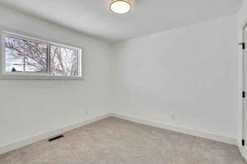 908 Stonehaven Road Sw, Calgary, AB - Indoor Photo Showing Other Room