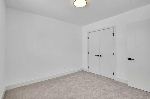 908 Stonehaven Road Sw, Calgary, AB - Indoor Photo Showing Other Room