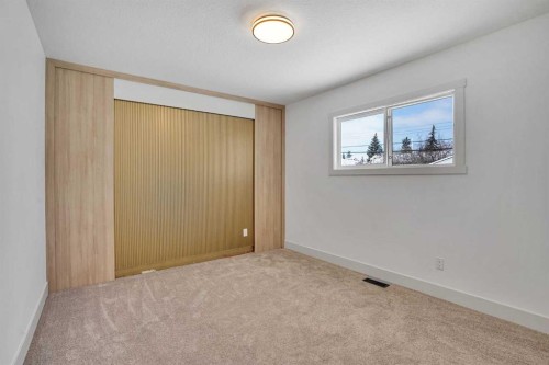 908 Stonehaven Road Sw, Calgary, AB - Indoor Photo Showing Other Room