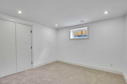 908 Stonehaven Road Sw, Calgary, AB - Indoor Photo Showing Other Room