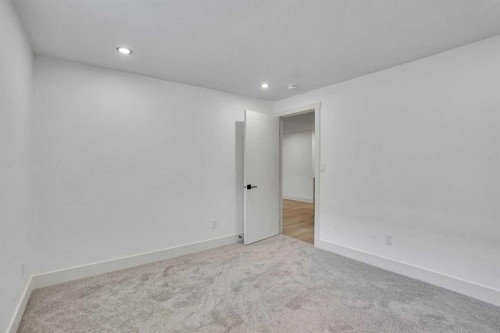 908 Stonehaven Road Sw, Calgary, AB - Indoor Photo Showing Other Room
