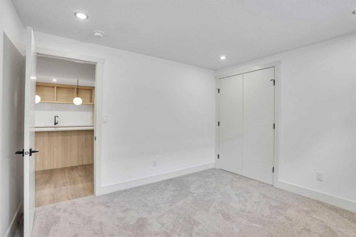 908 Stonehaven Road Sw, Calgary, AB - Indoor Photo Showing Other Room