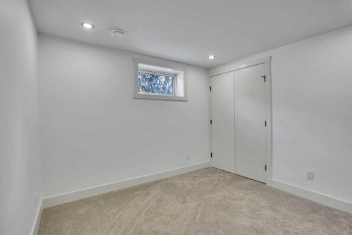 908 Stonehaven Road Sw, Calgary, AB - Indoor Photo Showing Other Room