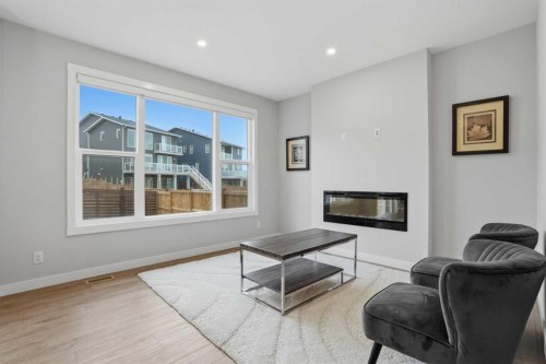 61 Calhoun Crescent Ne, Calgary, AB - Indoor Photo Showing Living Room With Fireplace