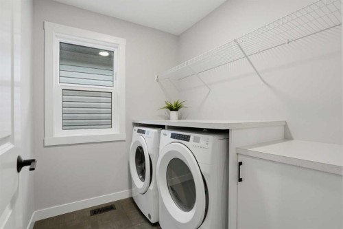 61 Calhoun Crescent Ne, Calgary, AB - Indoor Photo Showing Laundry Room